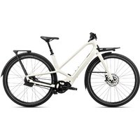 White Orbea DIEM 10 electric bike with sleek frame, black tires, rear rack, and front disc brakes.