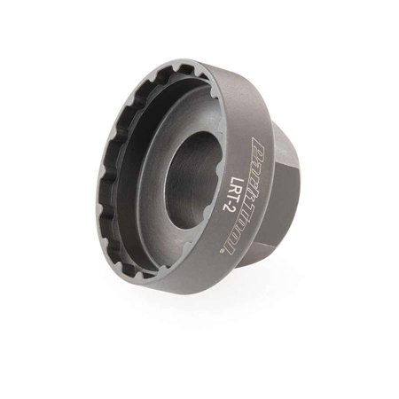 Gray metal lockring tool with a circular design and notched edge, labeled "Park Tool LRT-2," specifically designed for Shimano Steps components.