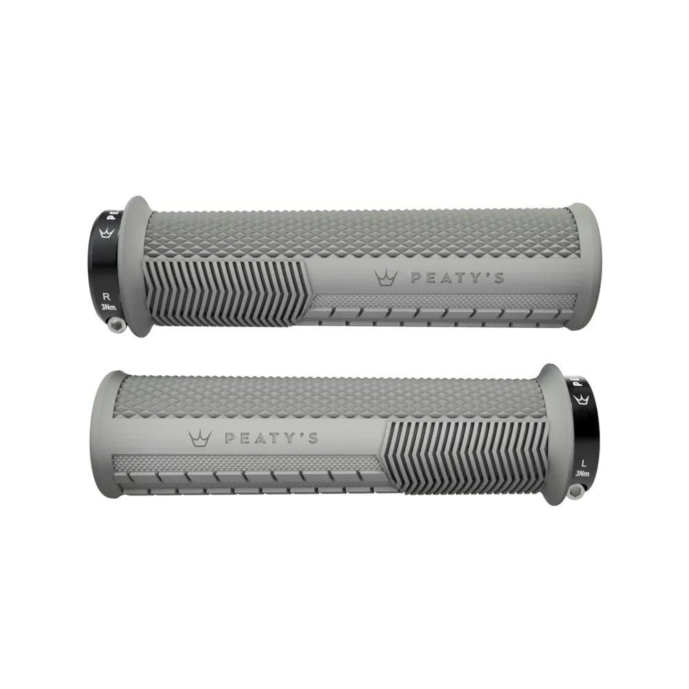 Thick slate gray grips with a knurled texture, featuring Peaty's branding and distinct left and right markings on the end caps for easy installation.