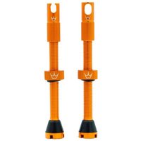Orange Peaty's x Chris King 60mm tubeless valves with black rubber base and crown logo.