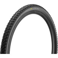 Black Pirelli Cinturato Gravel M tyre with textured tread pattern, 700c size, sleek design, yellow logo on sidewall.