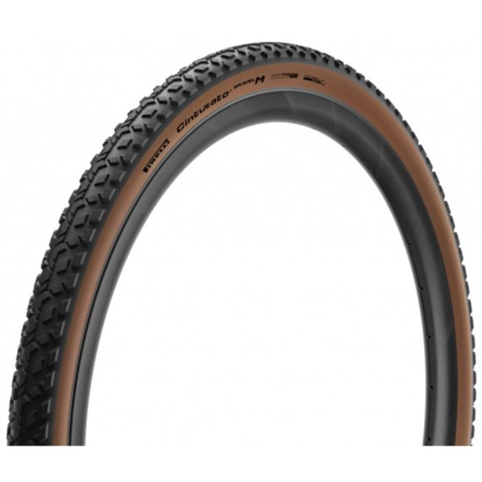 Pirelli Cinturato Gravel M HP-Line tire in 700x50C size, featuring a black tread with a brown sidewall, designed for tubeless use with a 120TPI construction.
