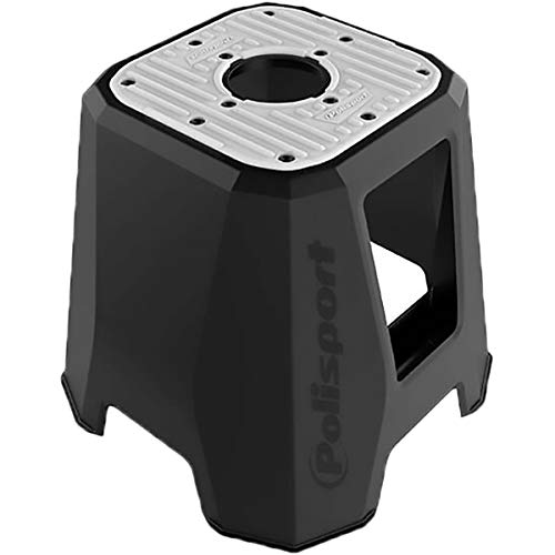 Black and grey rubber track stand with a hexagonal shape, featuring a textured top and a cut-out handle for easy transport, branded with the Polisport logo.