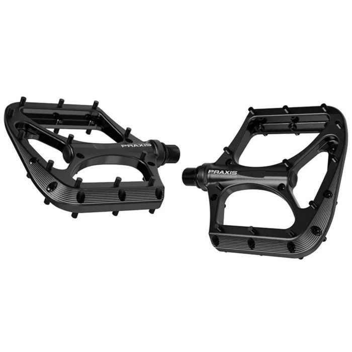 Black Praxis Works Brodium pedals featuring a lightweight design, textured surface for grip, and multiple pins for enhanced traction on each pedal.