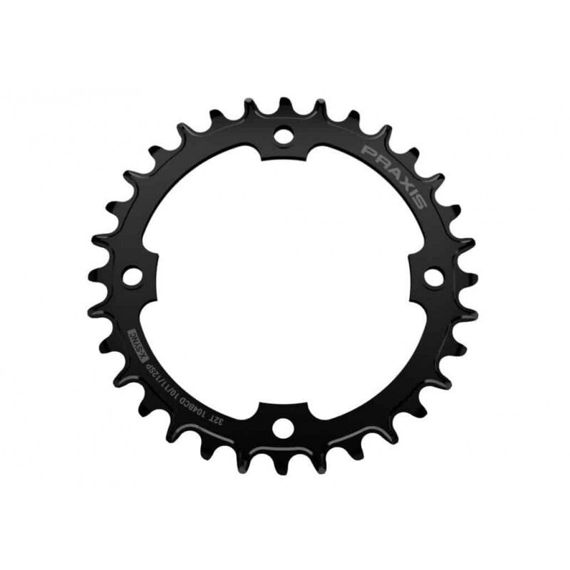 Black aluminum 34-tooth E-Ring chainring by Praxis Works, featuring a circular design with sharp teeth and engraved branding for enhanced performance and durability.
