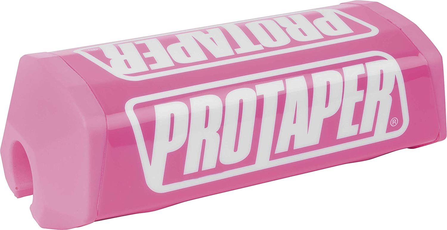 Bright pink molded bar pad with "PROTAPER" logo in white, designed for added comfort and protection on square handlebars.