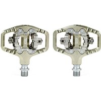 Gold Renthal Revo-TRC clipless pedals with dual-sided entry and durable metal construction for MTB and gravel bikes.