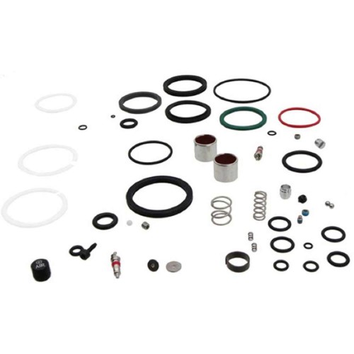 RockShox 50 Hour Rear Shock Air Can Service Kit featuring various rubber O-rings, metal components, and small seals in black, red, green, and white, all arranged neatly.