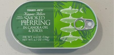 Green oval can featuring "Trader Joe's Kipper Fillets Smoked Herring" label, with illustrations of fish and a pull-tab, containing 4.4 oz of wild-caught herring in canola oil.