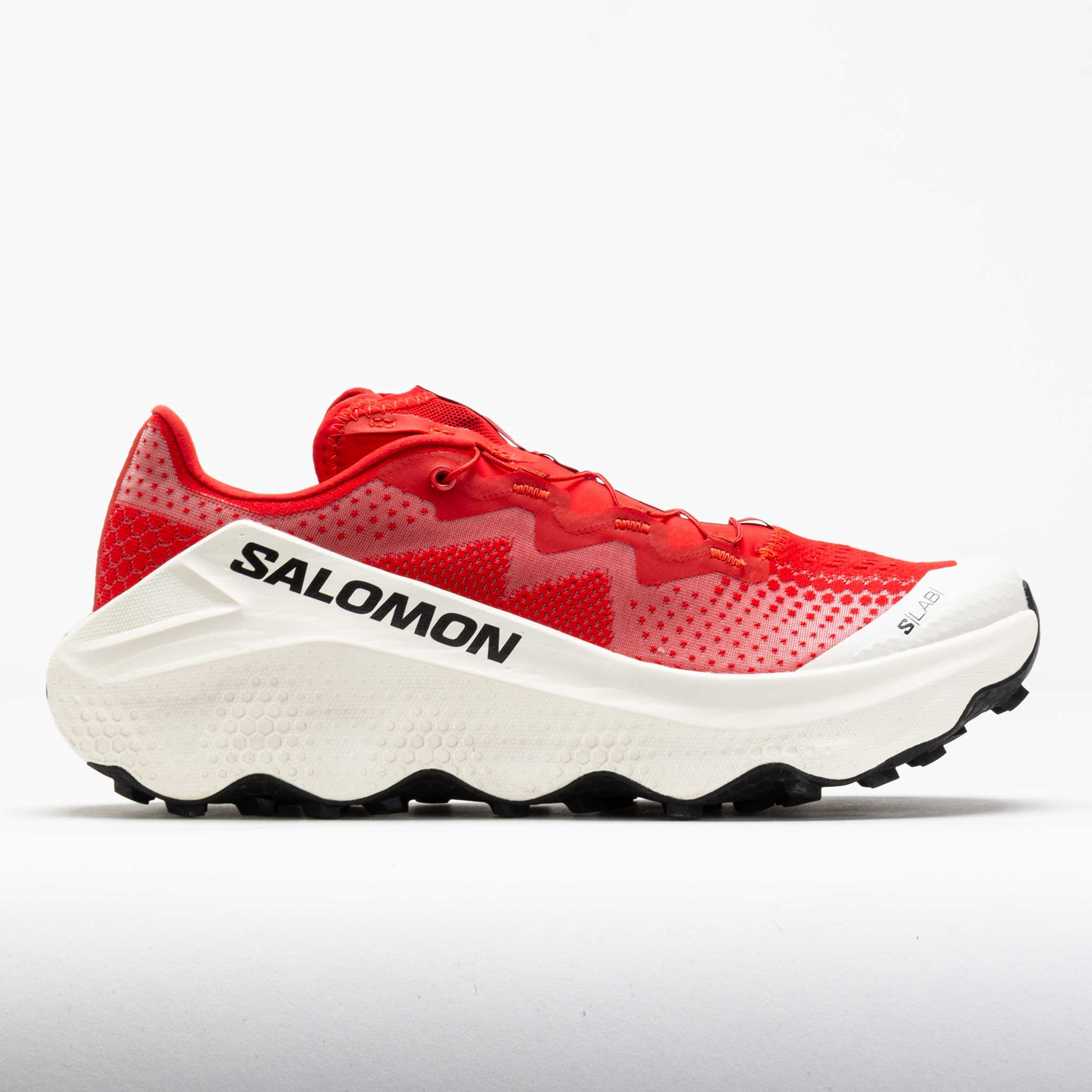 Bright red Salomon S/Lab Ultra Glide Trail Shoe featuring a breathable mesh upper, prominent cushioning, and a rugged white outsole designed for trail running.