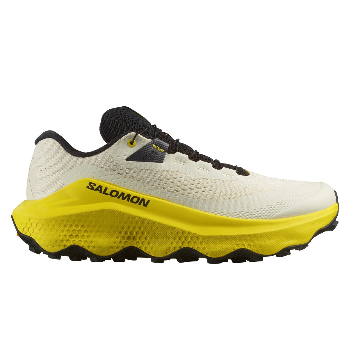 Salomon Ultra Glide 3 men's running shoes feature a lightweight almond milk upper with black accents, a cushioned yellow midsole, and a rugged outsole for traction, size 6.5.