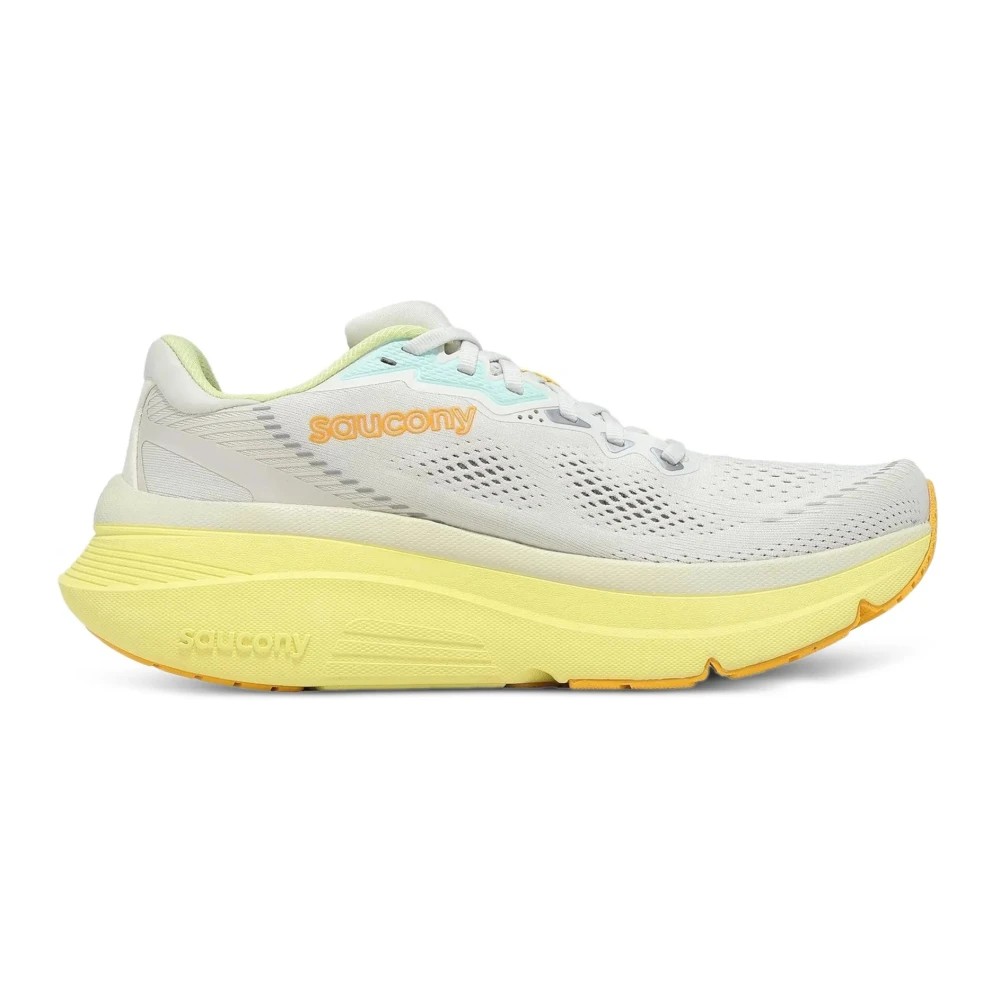 Beige Saucony Guide 19 running shoes for women, featuring a breathable mesh upper, cushioned sole in yellow and orange accents, size 39 EU.