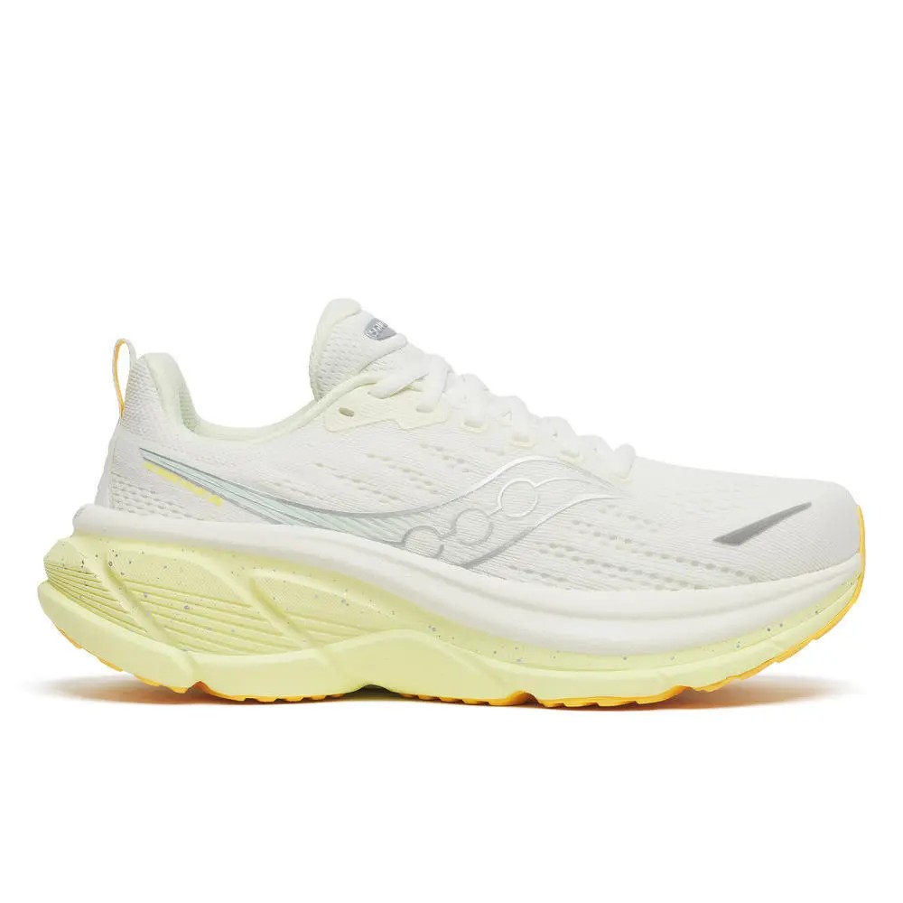 White women's running shoes with a textured upper, featuring reflective silver accents and a bright yellow sole for added visibility and cushioning.