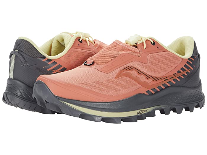 Saucony Peregrine 11 St women's trail running shoes in rust and charcoal with orange and black accents, featuring a textured upper, cushioned sole, and rugged outsole for traction.