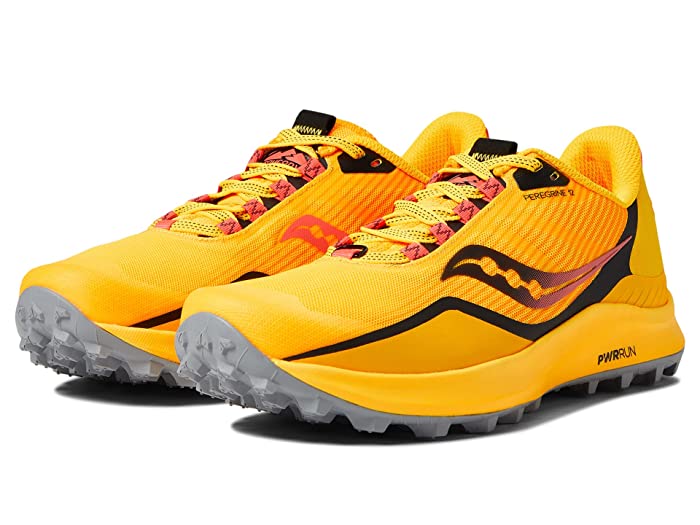 Bright yellow trail running shoes with red and black accents, featuring a lightweight mesh upper, cushioned sole, and aggressive outsole for traction. Size 10.