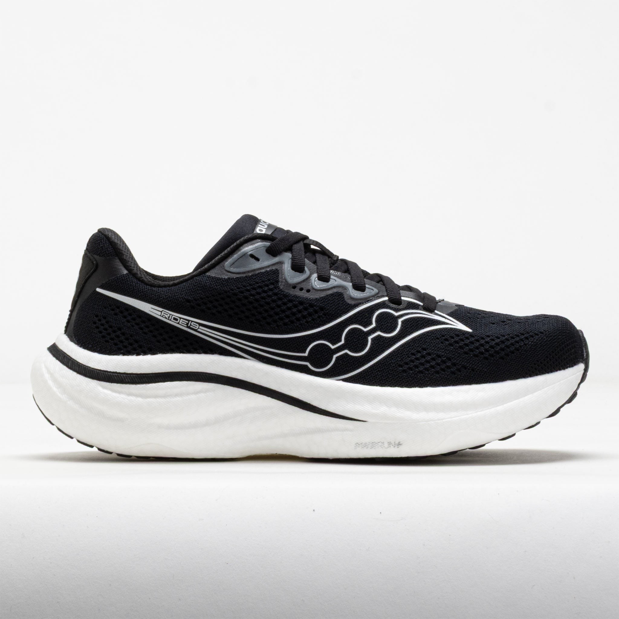 Black running shoes with a mesh upper, featuring white Saucony logo stripes, a cushioned white midsole, and a sleek design ideal for comfort and performance.