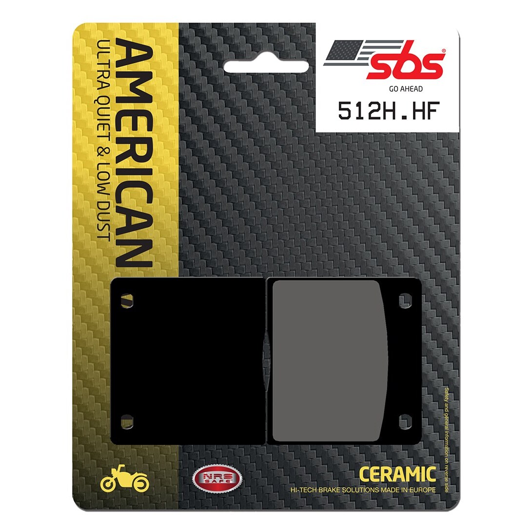 Black ceramic brake pads packaged in a sleek black and yellow card with "AMERICAN" and "512H.HF" prominently displayed, emphasizing ultra-quiet and low dust features.