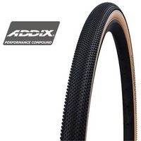 Black Schwalbe G-One 700c tyre with tan sidewall, textured tread, ADDIX Performance Compound logo.