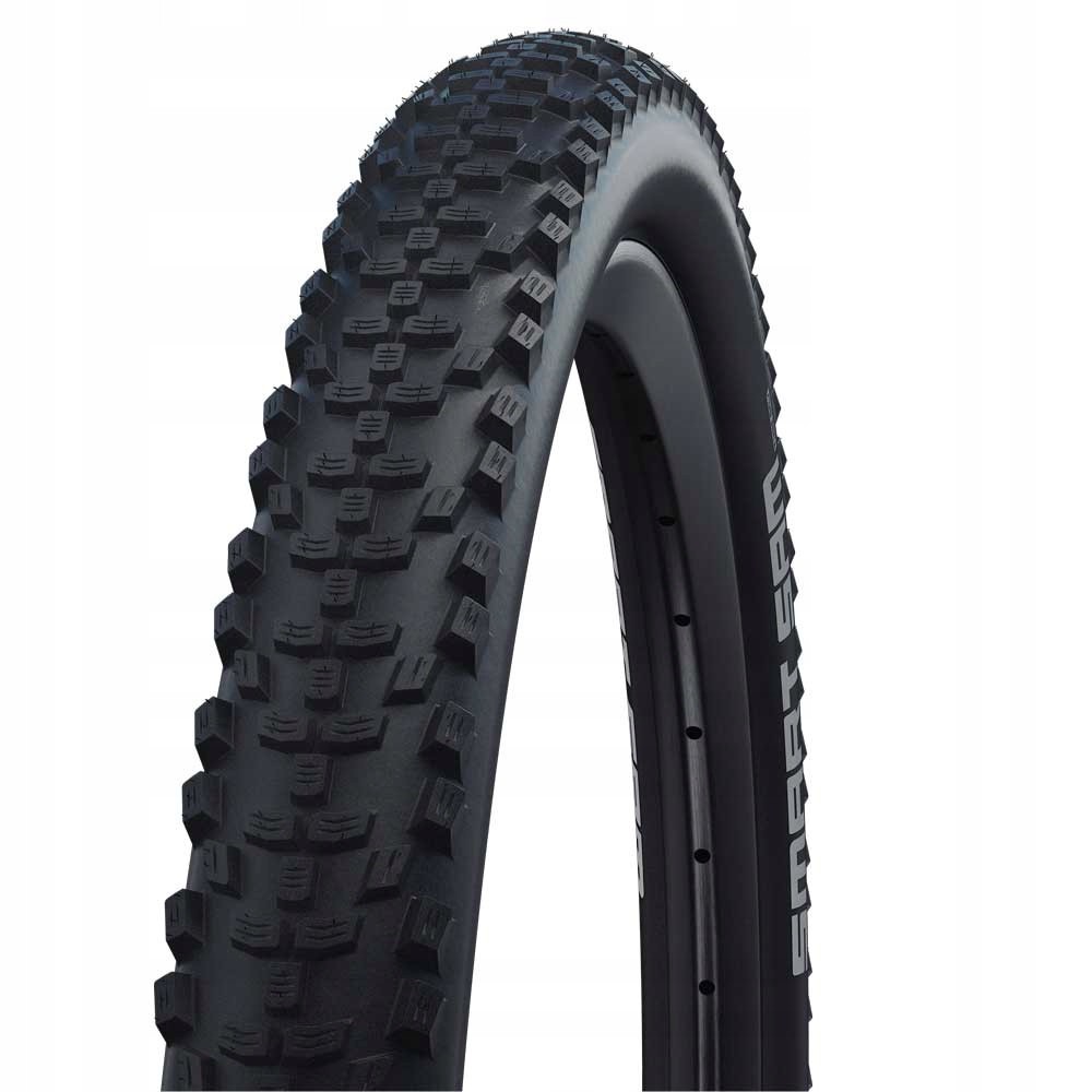 Black bike tire with a rugged tread pattern, featuring raised knobs for traction, labeled "Schwalbe Smart S.a.M HS624 Perf K-Guard" on the sidewall.