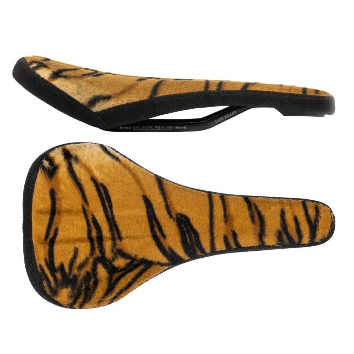 Limited edition SDG Bel-Air V3 saddle featuring a tiger-striped design, measuring 260 x 140mm, unisex, with a soft, plush surface and lightweight construction at 290g.
