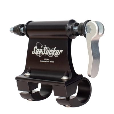 Black aluminum bike carrier with a shiny silver lever, designed for 100mm x 12mm thru axles, featuring two mounting clamps and the SeaSucker logo prominently displayed.