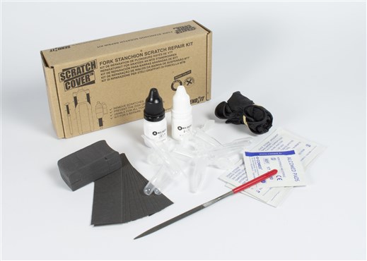 Black Sendhit Scratch Cover Stanchion Repair Kit, featuring two bottles of repair solution, black gloves, sandpaper, a file, and instructions, all in a cardboard box.