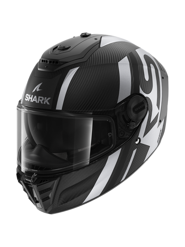 Shark Spartan RS Carbon motorcycle helmet in matte carbon and silver, featuring a sleek design, integrated visor, and aerodynamic shape for enhanced performance.