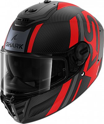 Shark Spartan RS Carbon motorcycle helmet in matte carbon with anthracite and red accents, featuring a sleek design, visor, and ventilation system.
