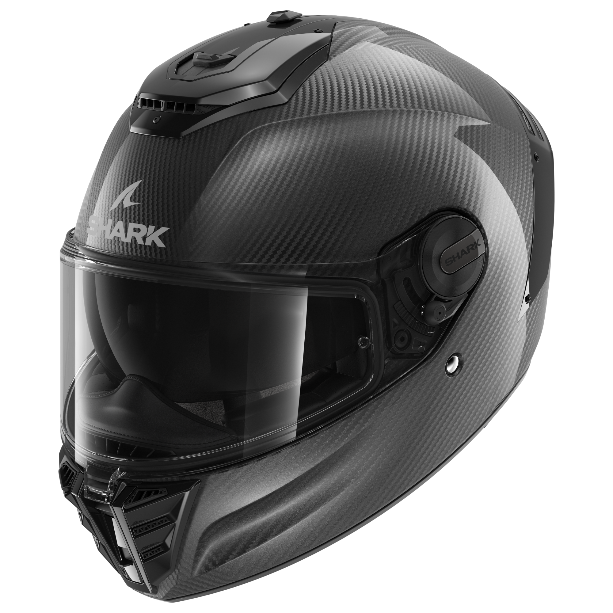 Shark Spartan RS Carbon Skin Motorcycle Helmet in carbon black features a sleek, aerodynamic design, a clear visor, and a matte finish with textured carbon fiber details.