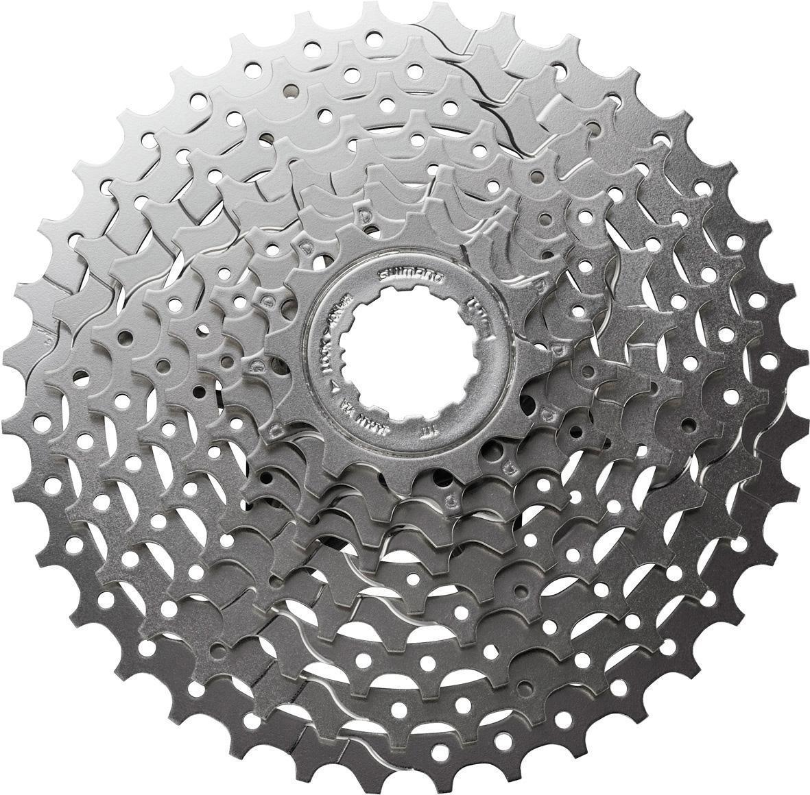 Silver Shimano Alivio 9-speed cassette with 11-36T gear range, featuring multiple sprockets and intricate gear teeth design.