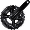 Black Shimano FC-R7100 105 double chainset features a 175mm crank arm length and 50/34T chainrings, showcasing a sleek, aerodynamic design with a glossy finish.
