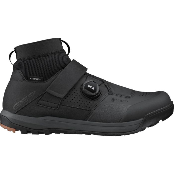 Black Shimano GE9 (GE900) Gore-Tex shoes in size 44 feature a sleek design, waterproof material, a secure strap closure, and a textured sole for grip.