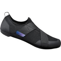Black Shimano IC1 indoor cycling shoes with mesh panels, Velcro straps, and a loop at the heel.