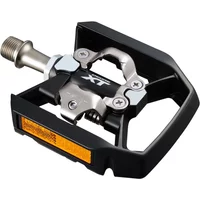 Black Shimano PD-T8000 XT MTB SPD trekking pedals with silver axle, reflective strip, and "XT" logo.