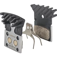 Shimano R805/R505 disc brake pads with metallic compound, black cooling fins, and silver backing plate.