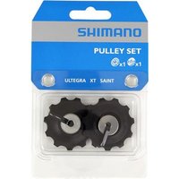 "Black Shimano pulley set with two round gears in clear plastic packaging, labeled Ultegra, XT, Saint"