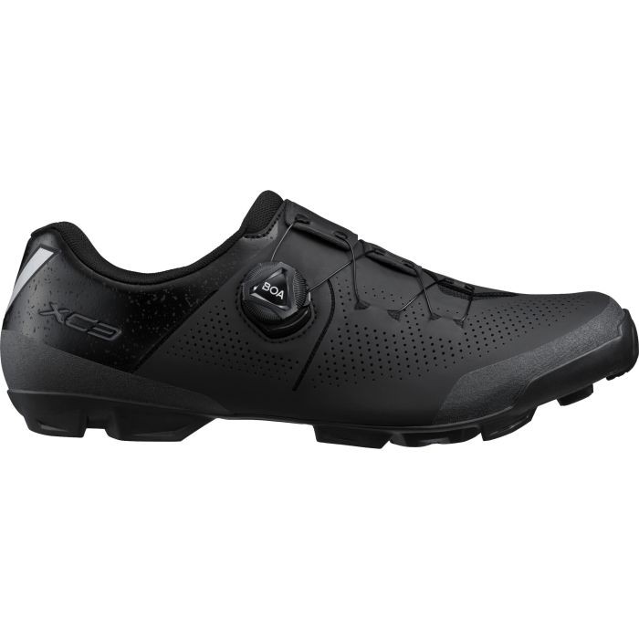 Black Shimano XC3 (XC302) cycling shoes in size 42 Wide, featuring a sleek design, perforated material for breathability, and a Boa dial for secure fit adjustment.