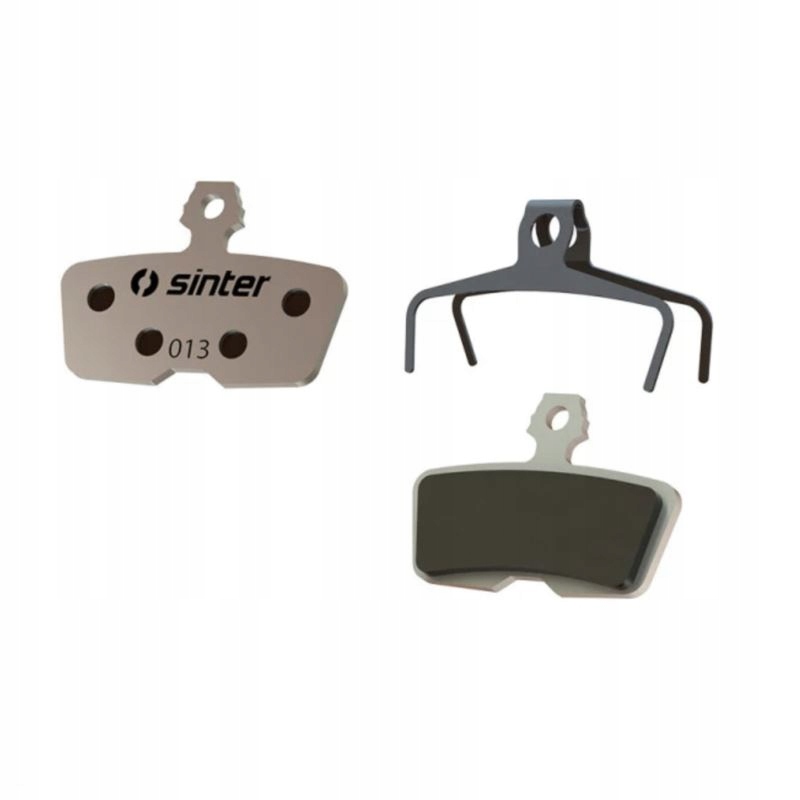 Green Sinter 13 SRAM disc brake pads featuring a metallic backing and a distinctive shape, designed for CODE DB8 MOTIVE systems, with a mounting clip included.