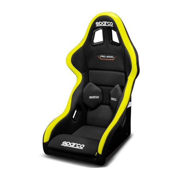 Sparco Pro 2000 QRT fibreglass sim racing seat in black with fluro yellow accents, featuring ergonomic design, side bolsters, and Sparco branding on the headrest and seat.