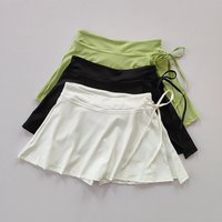 Green, black, and white sports yoga skirts with side splits, quick-drying fabric, and adjustable strap detail.