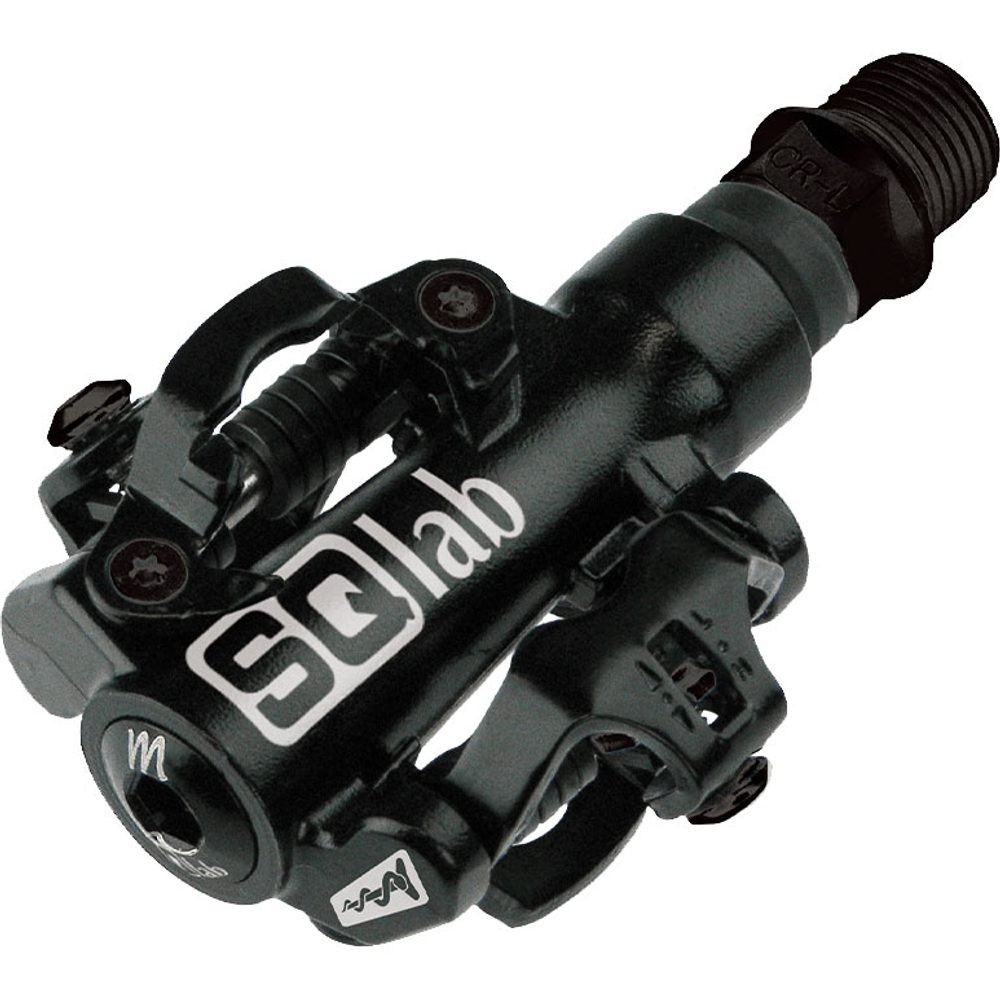 Black SQlab 511 XL X-Long pedals featuring a sturdy design, adjustable tension, and prominent SQlab branding, ideal for enhanced grip and performance in cycling.
