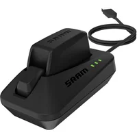 Black SRAM eTAP battery charger with cord, featuring three green indicator lights and compact design.