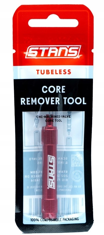 Red CNC-machined core remover tool by Stans NoTubes, packaged in a clear plastic backing with a red and white header, labeled as "Tubeless Core Remover Tool."