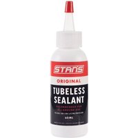 Stans NoTubes Tyre Sealant, 60ml white bottle with red cap and label, black text "Tubeless Sealant"