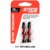 Red 44mm Stans NoTubes Universal Presta Alloy Valve Stem with black caps and removable core on branded packaging.