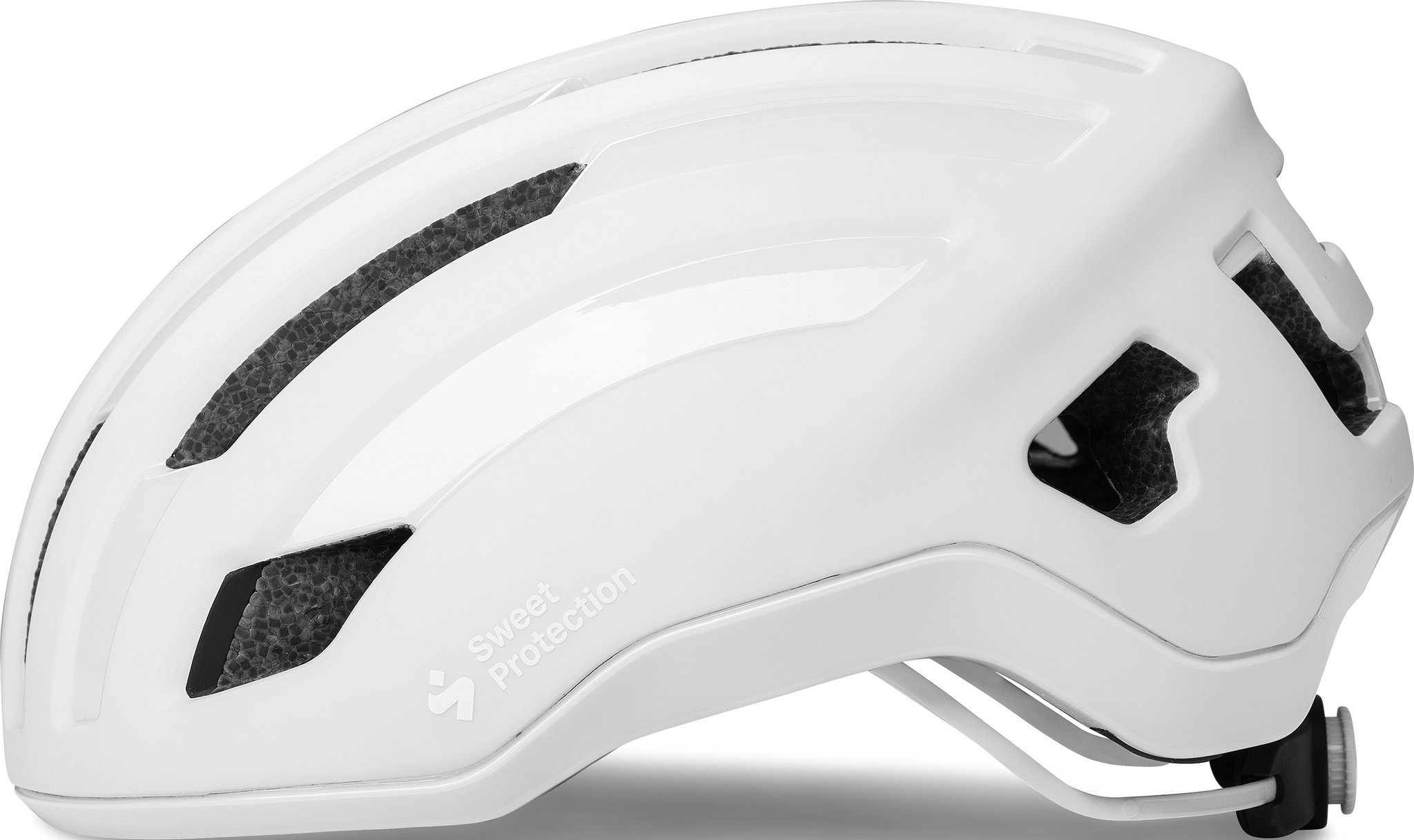 Matte white Sweet Protection Outrider MIPS helmet in size large, featuring a sleek design, ventilation slots, and a secure adjustment system for optimal fit and safety.