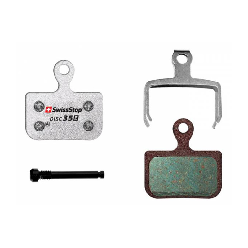 Black SwissStop D35 disc brake pads with metal backing, featuring a green friction material, accompanied by a silver retaining clip and a black mounting bolt.