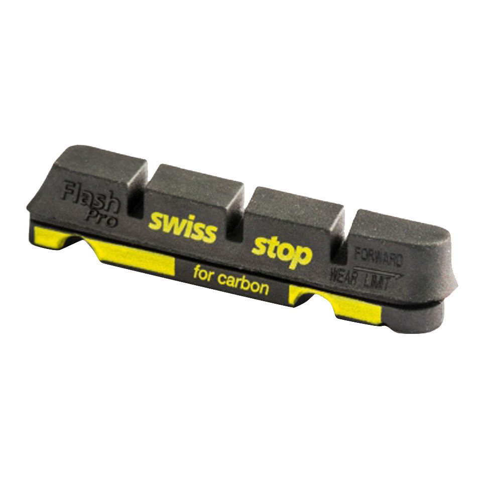 Black rubber brake pad with yellow accents, labeled "Flash Pro" and "swiss stop," designed specifically for carbon rims, featuring a streamlined shape for optimal performance.