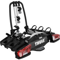 Thule VeloCompact 3-bike towball carrier, black with silver accents, adjustable arms, and integrated taillights.