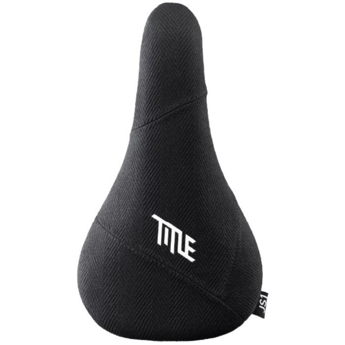 Black beach cloth saddle with a sleek, ergonomic shape, featuring a prominent white "Title" logo and a textured surface for enhanced grip and comfort.